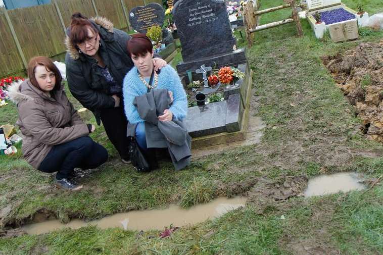 Ian White’s wife Sharon, centre, with daughters Hannah, left, and Emily