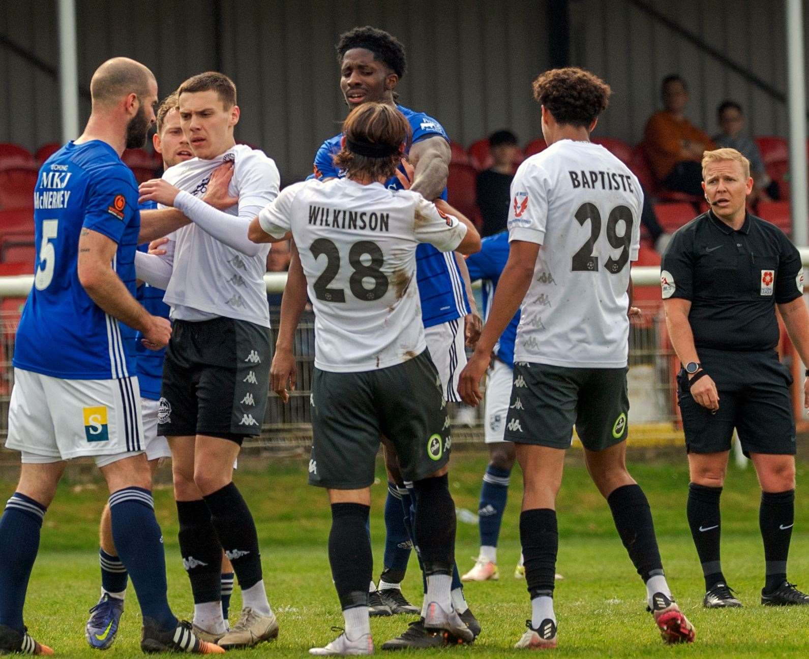 A tussle breaks out at Crabble between the two sides. Picture: Stuart Brock