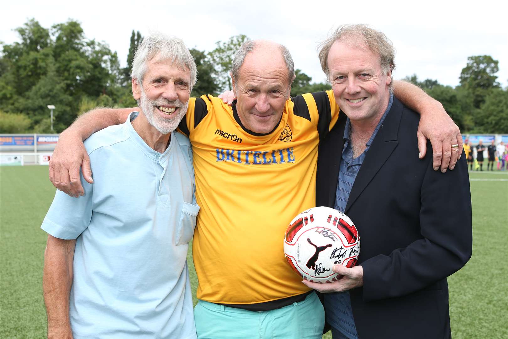 The pair at a charity football match with Chelsea star Kerry Dixon