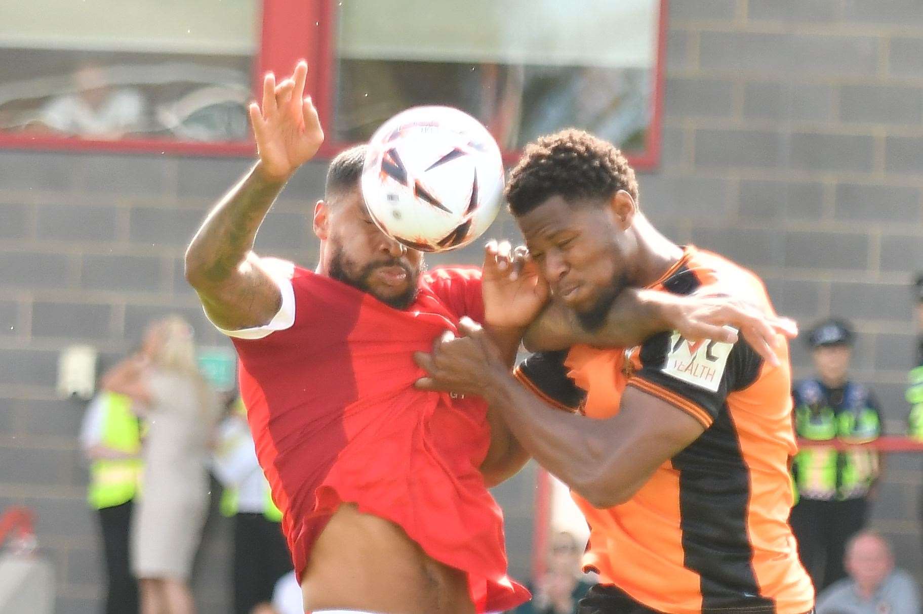 Ebbsfleet challenge for the ball in the air against Barnet defender Ade Oluwu. Picture: Ed Miller/EUFC