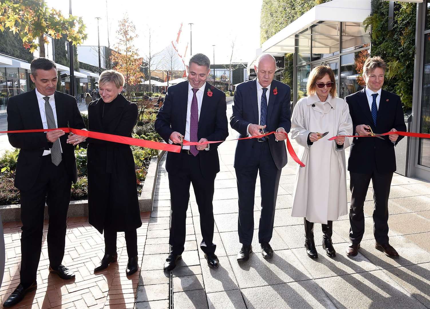 (L to R) Managing director Christophe Deshayes, deputy CEO Susie McCabe, centre manager Peter Corr, Rt Hon Damian Green, CEO Julia Calabrese and regional development director Claude Hargreave. Picture: Dave Benett