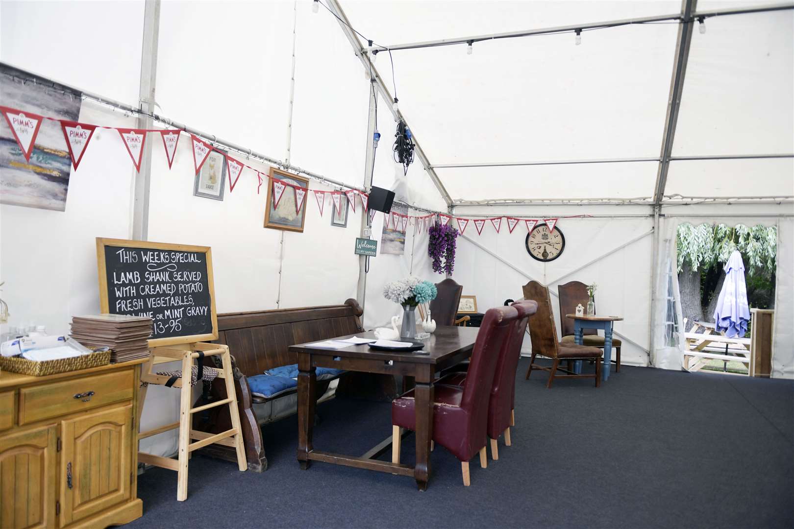 Furniture has been moved from inside the damaged pub to an outside marquee. Picture: Barry Goodwin