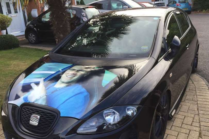 A picture of Josh has been placed on the car that his friends helped buy back in his memory