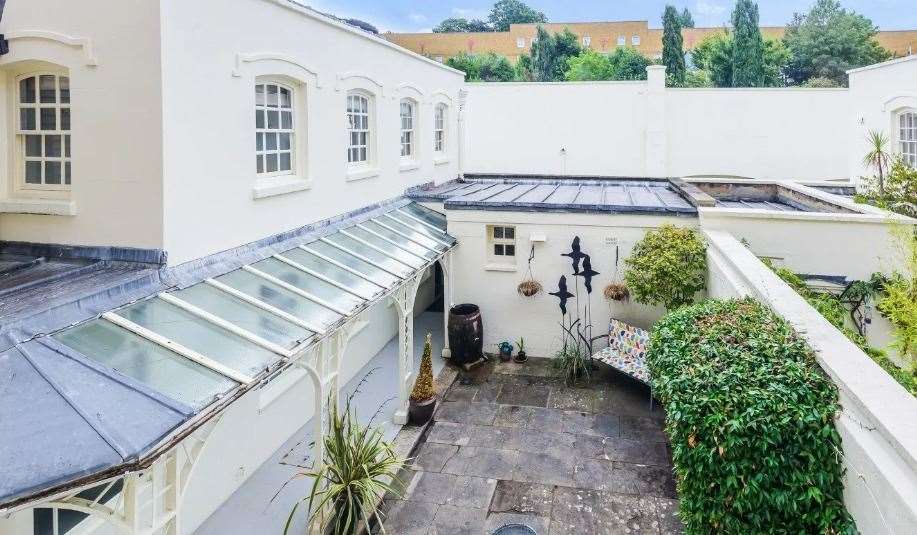 The courtyard, just outside the kitchen, is a great spot for a morning coffee. Picture: Fine and Country