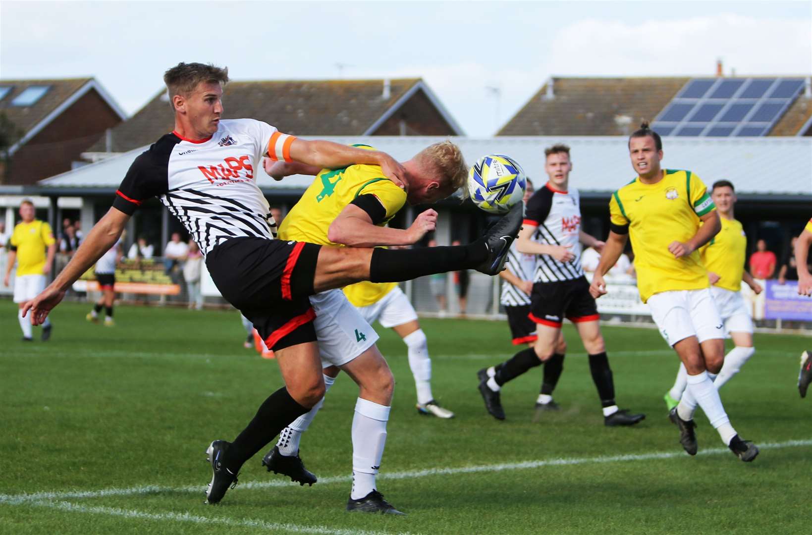 Deal captain Kane Smith is challenged by Tom Fitzgerald of Corinthian at the Charles Sports Ground in late September. Picture: Paul Willmott