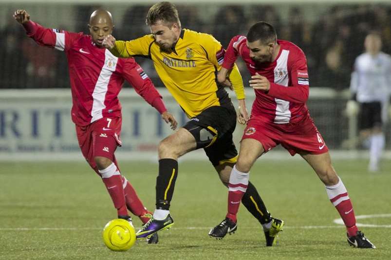 Zac Attwood heads goalwards for Maidstone during this season's Ryman League Cup tie against Grays Athletic Picture: Andy Payton