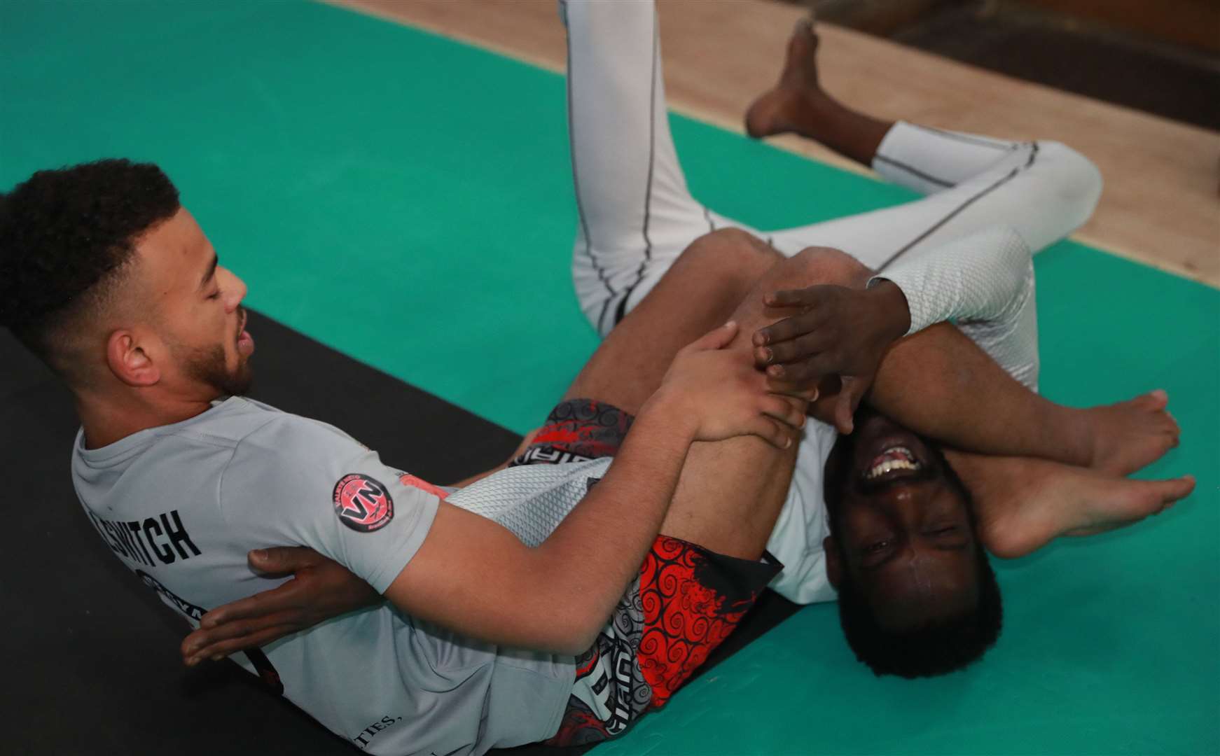 Kayne grapples with coach Chris