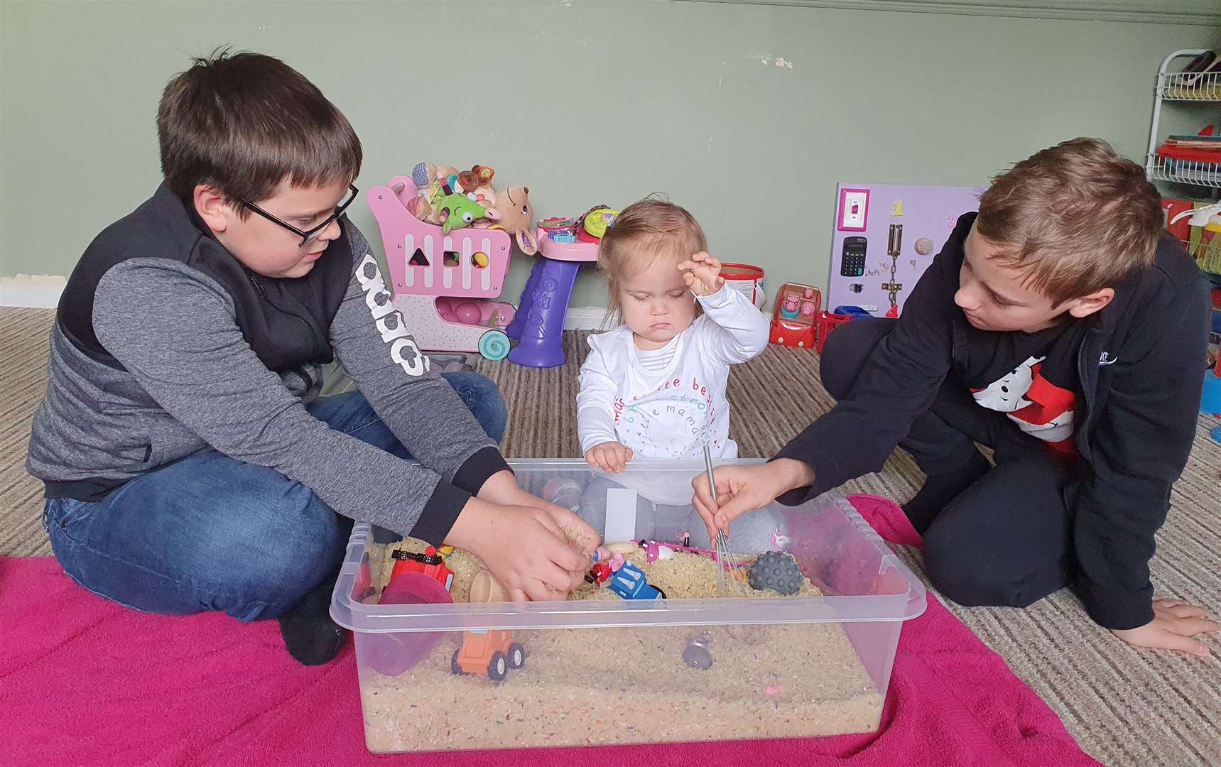 Jennifer loves to play with big brothers Tyler and Jacob