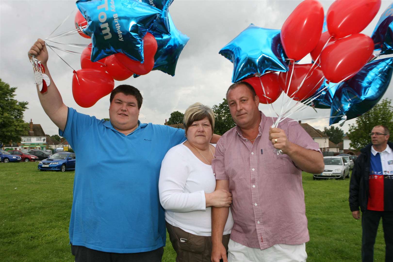 Tom's brother Sam, dad Paul, and mum Glenda releasing balloons in his memory shortly after he died. Picture: Matthew Walker