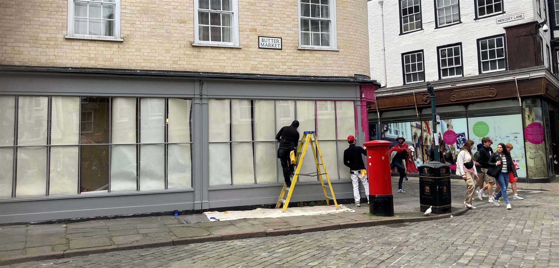 The former pink facade has been replaced with a more sensitive light grey colour scheme