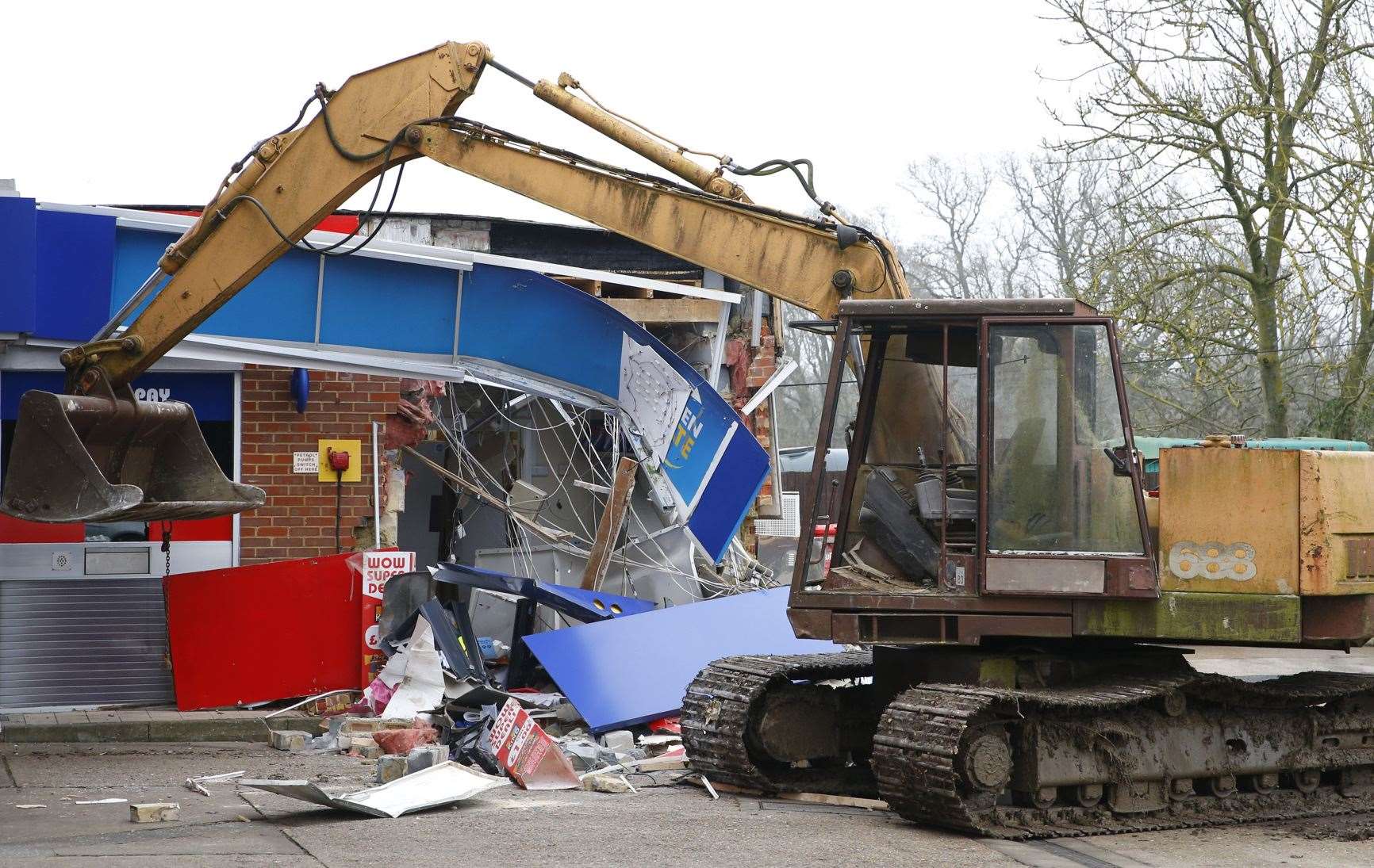 A digger was used to rip the cash machine from the wall of the garage in Staplehurst