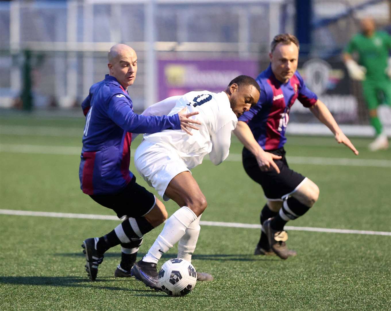 DFDS Kent Veterans Cup Final action between The Charcoal (white) and Warlingham (blue/claret). Picture: PSP Images