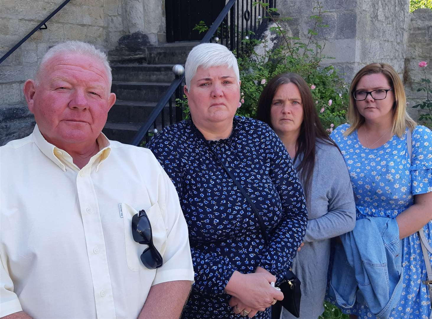 Alex Holland's parents Mark and Rachel Holland and his sisters Louise and Victoria just after the hearing