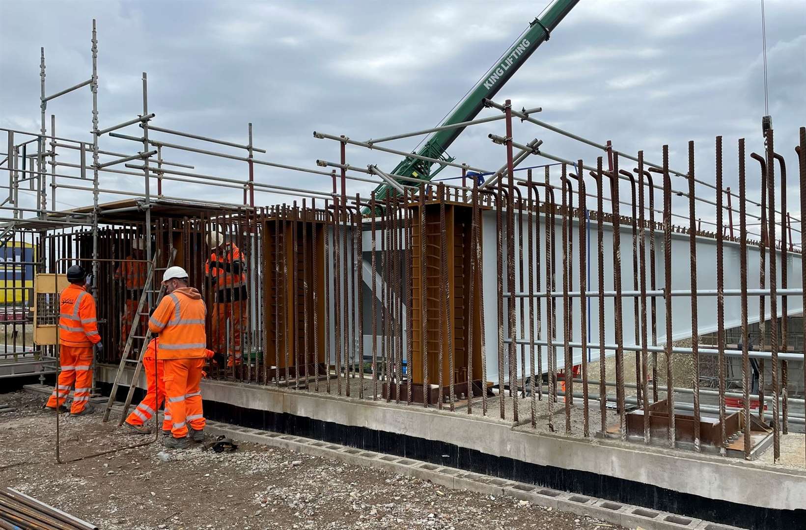 Engineers at work putting steel rods in place as part of formwork on the new Grovehurst bridge. Picture: Joe Crossley