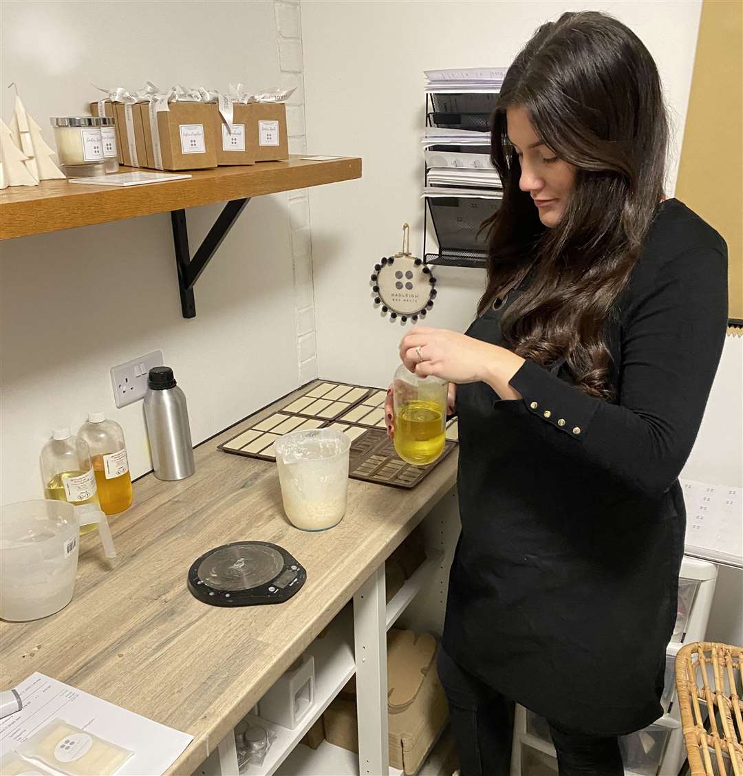 Lucy Riley at work making her wax melts