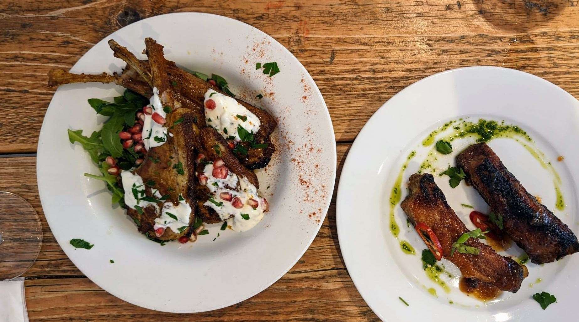 Spiced lamb cutlets with mint yogurt, left, and pork ribs with a membrillo glaze