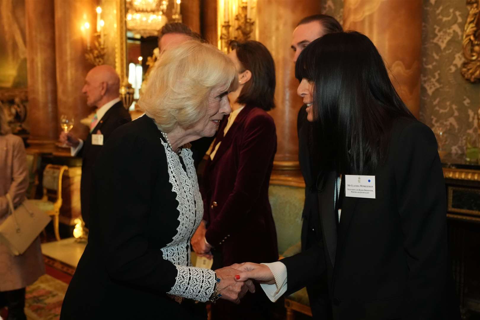 Queen Camilla with Claudia Winkleman during a reception to mark the centenary of the Film and TV charity, at Buckingham Palace, London (Aaron Chown/PA)