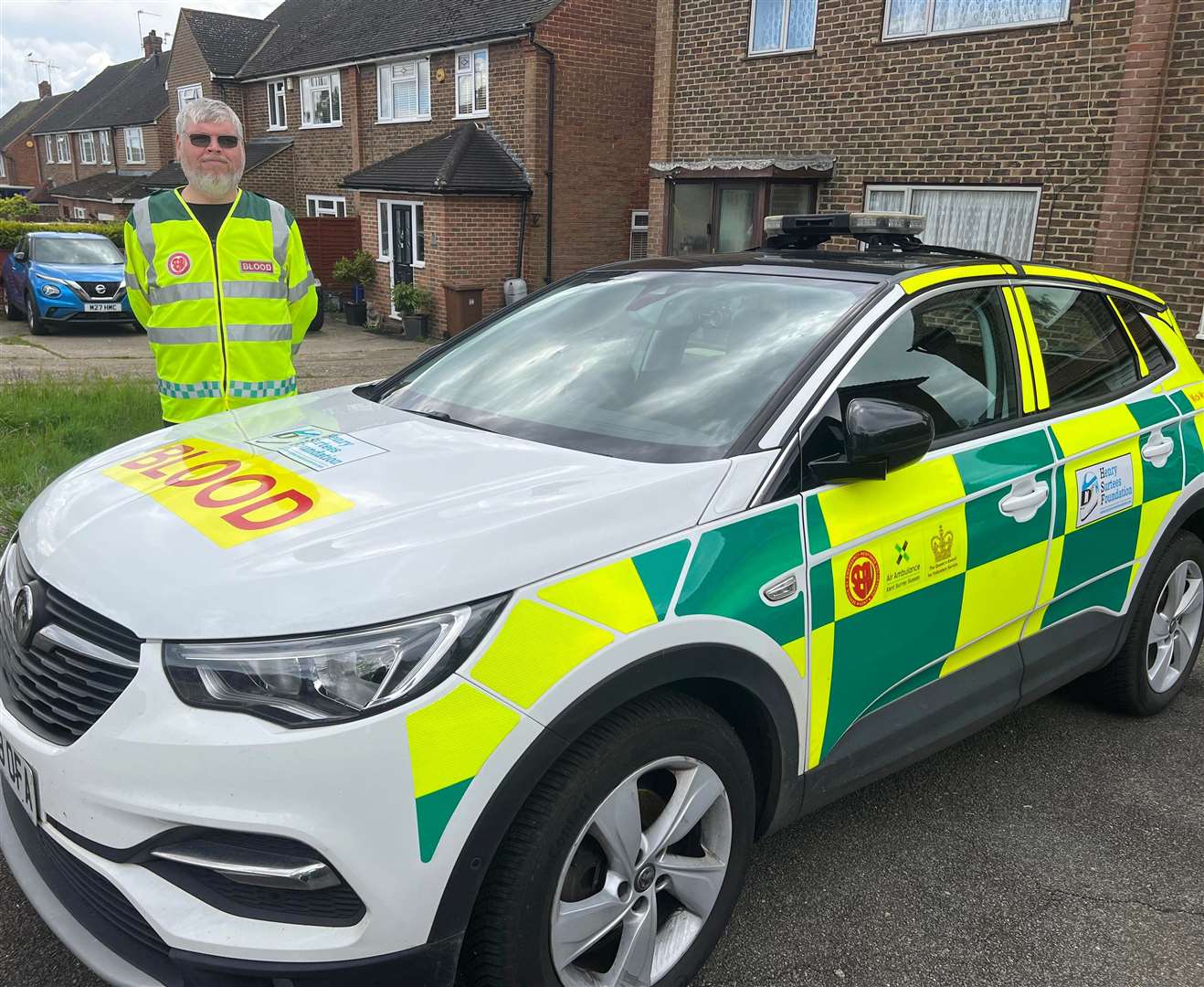 SERV Kent Bloodrunners secretary Johan with Mick-Mac, the charity's blood car