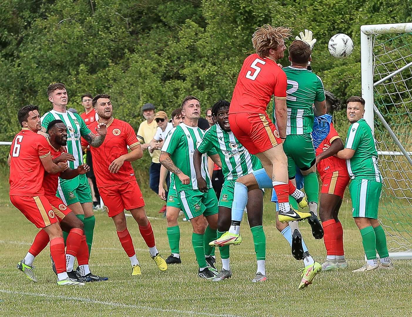 Sutton Athletic (green/white) drew 3-3 with Whitstable on the opening day of the season. Picture: Les Biggs