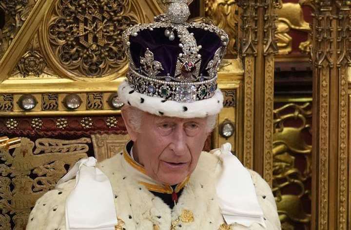 Charles looks up as he reads the King’s Speech, during the State Opening of Parliament. Picture: Kirsty Wigglesworth / PA