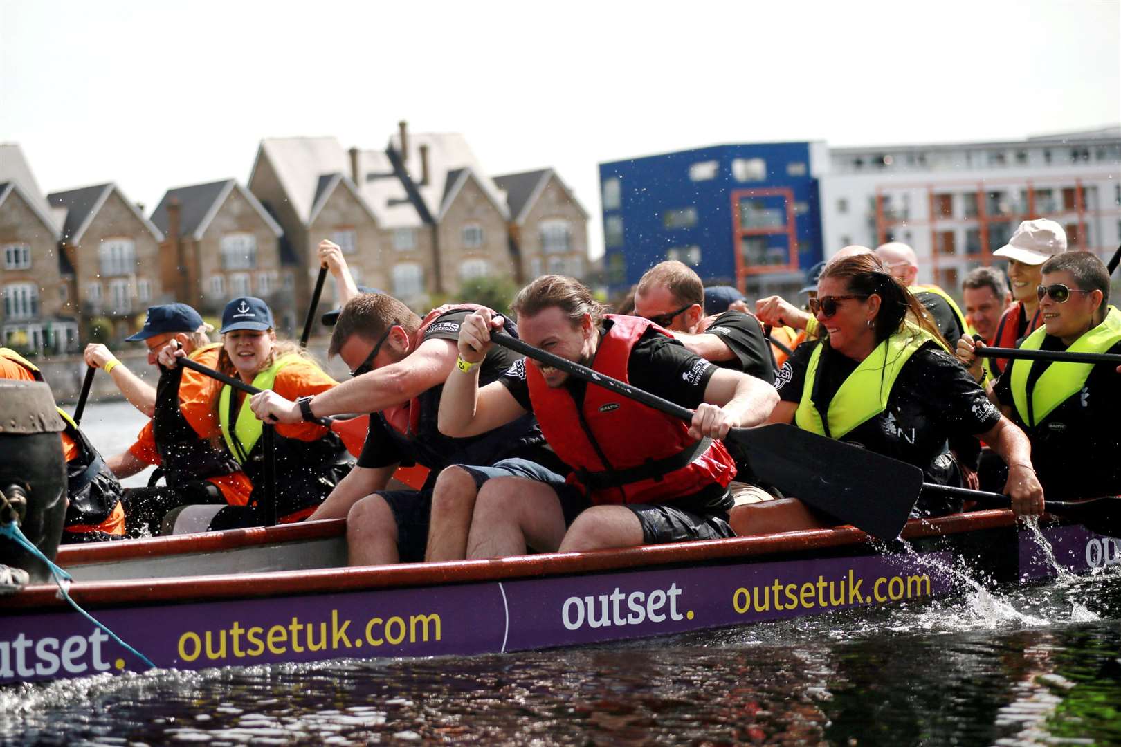 Cheer on the dragon boat rowers as you tuck into your food and sip your drinks. Picture: Phil Lee