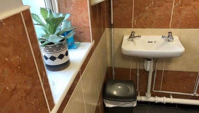 Even the gents is treated to a pot plant here