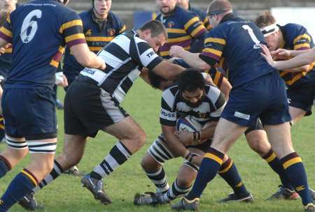 Gravesend keep hold off the ball against Old Colfeians