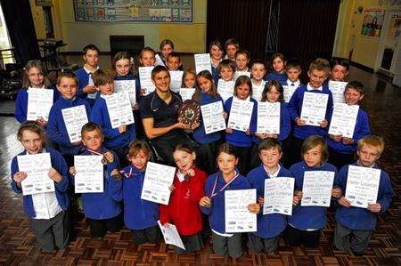 Paralympics hopeful Steve Brown with the Halfway Houses Primary School winning cross country team