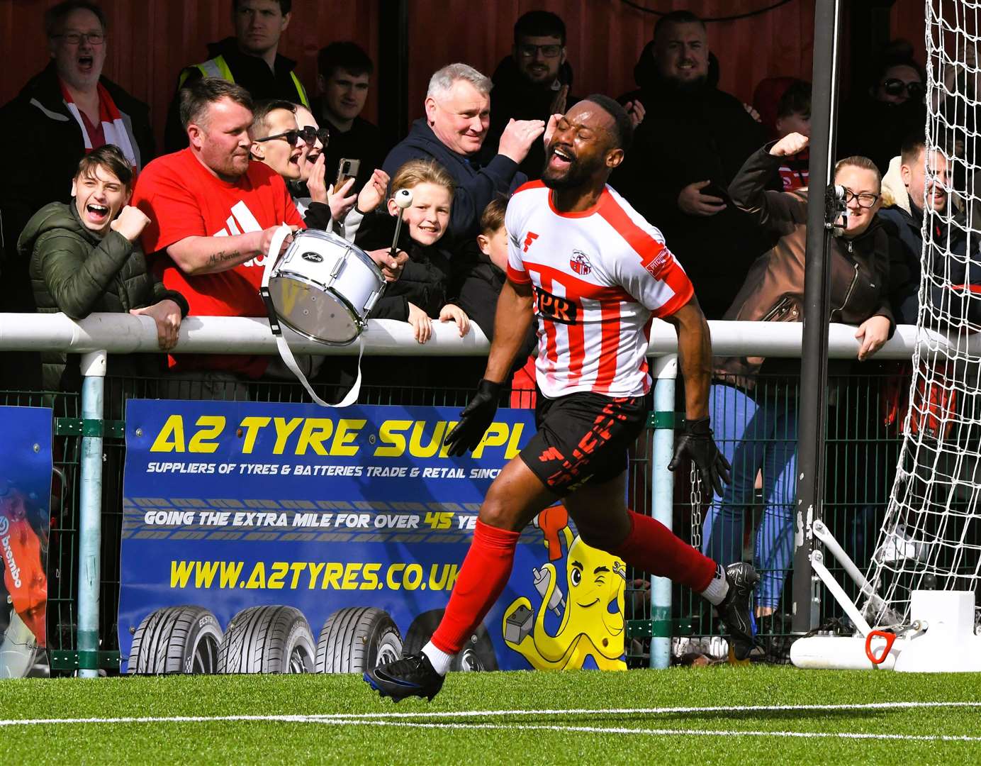 Sheppey’s Jerson Dos Santos celebrates the first of his two goals against Hythe on Monday Picture: Marc Richards