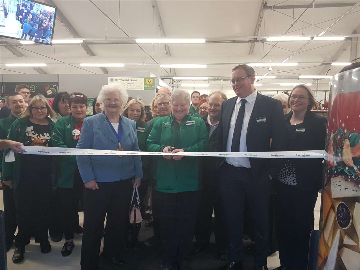 Mayor Cllr Ann Berry, worker Debra Reed and store manager Andrew Parkinson (5807347)