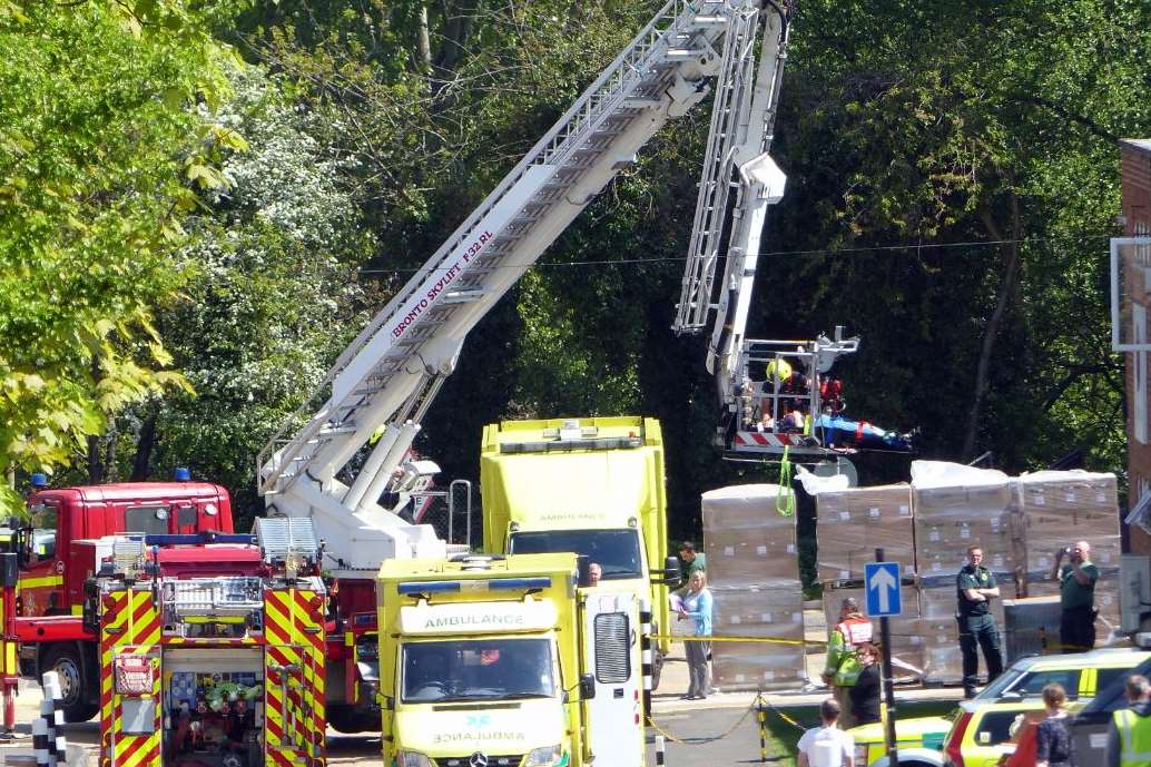 A height ladder was used to carry someone from a window