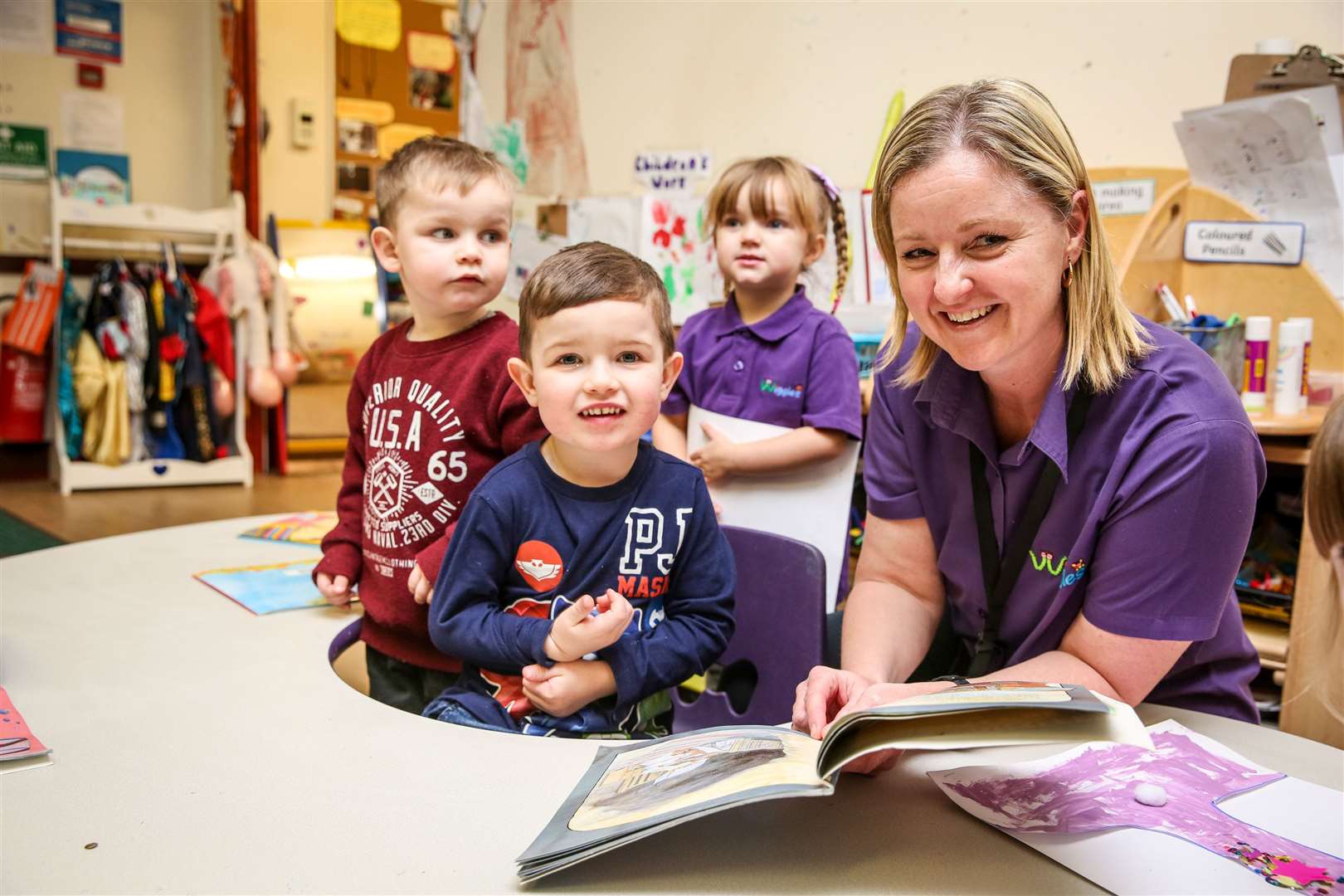 Shelley Gould with children Harley, Teddy, and Gracie after Wiggles Playgroup was rated 'outstanding' by Ofsted. Picture: Matthew Walker