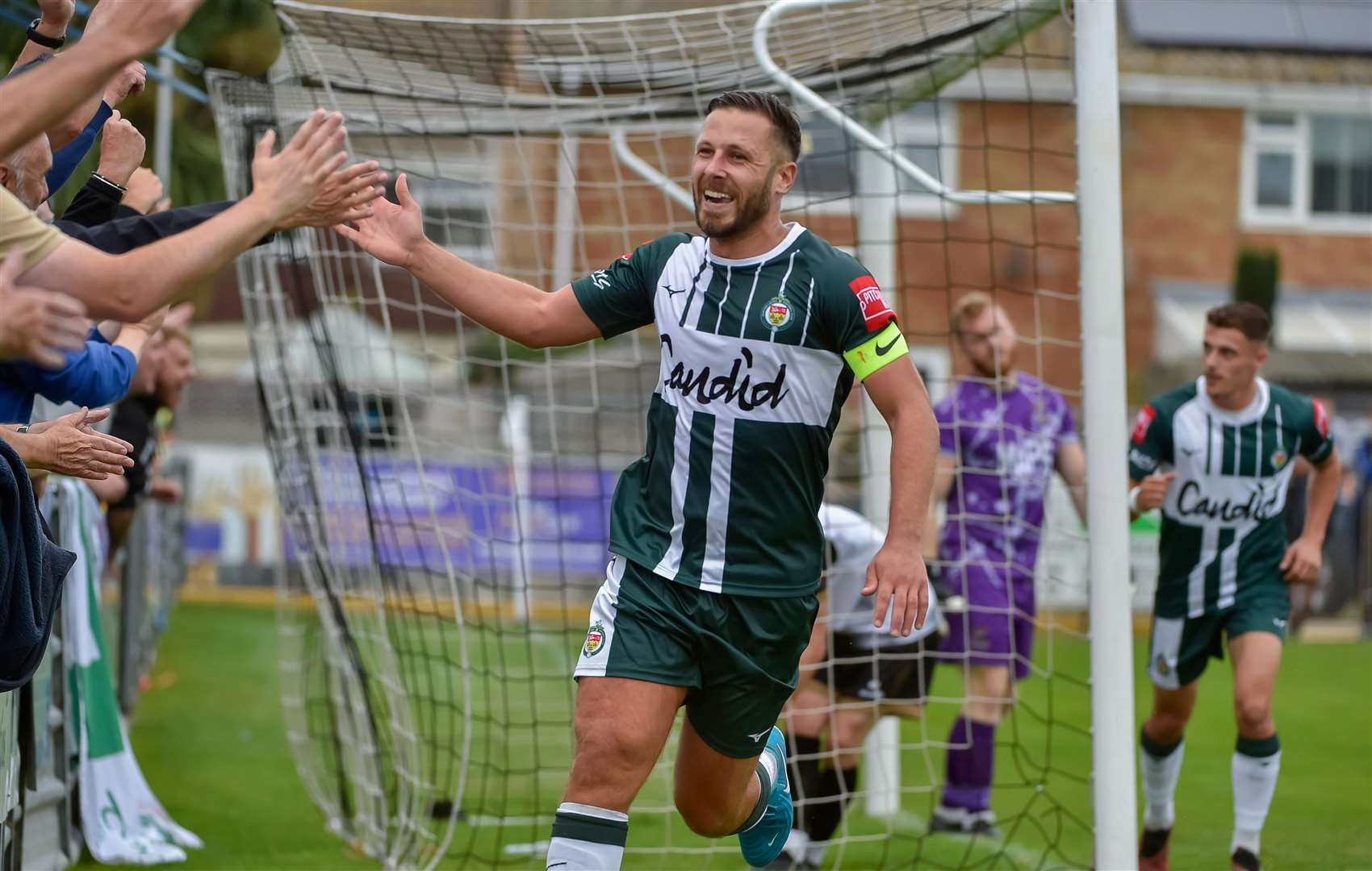 Craig Stone celebrates scoring the only goal of the game as Ashford won at Deal in the FA Trophy on Saturday. Picture: Ian Scammell