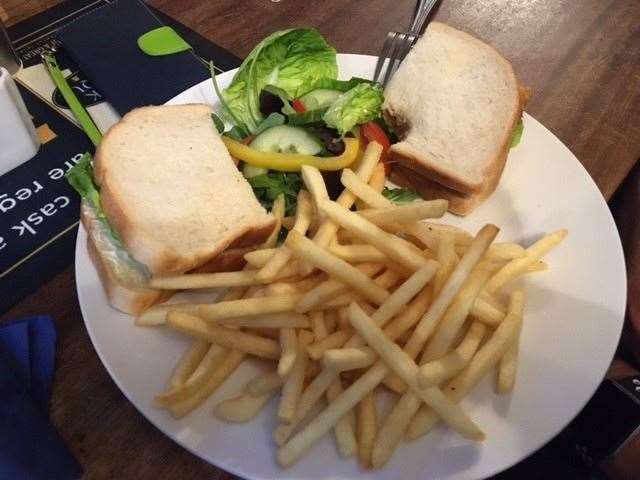 I said I should take a picture first, but when Mrs SD’s fish finger sandwich arrived she’d taken a bite in no time. Traditional, like the rest of the pub, but great value.