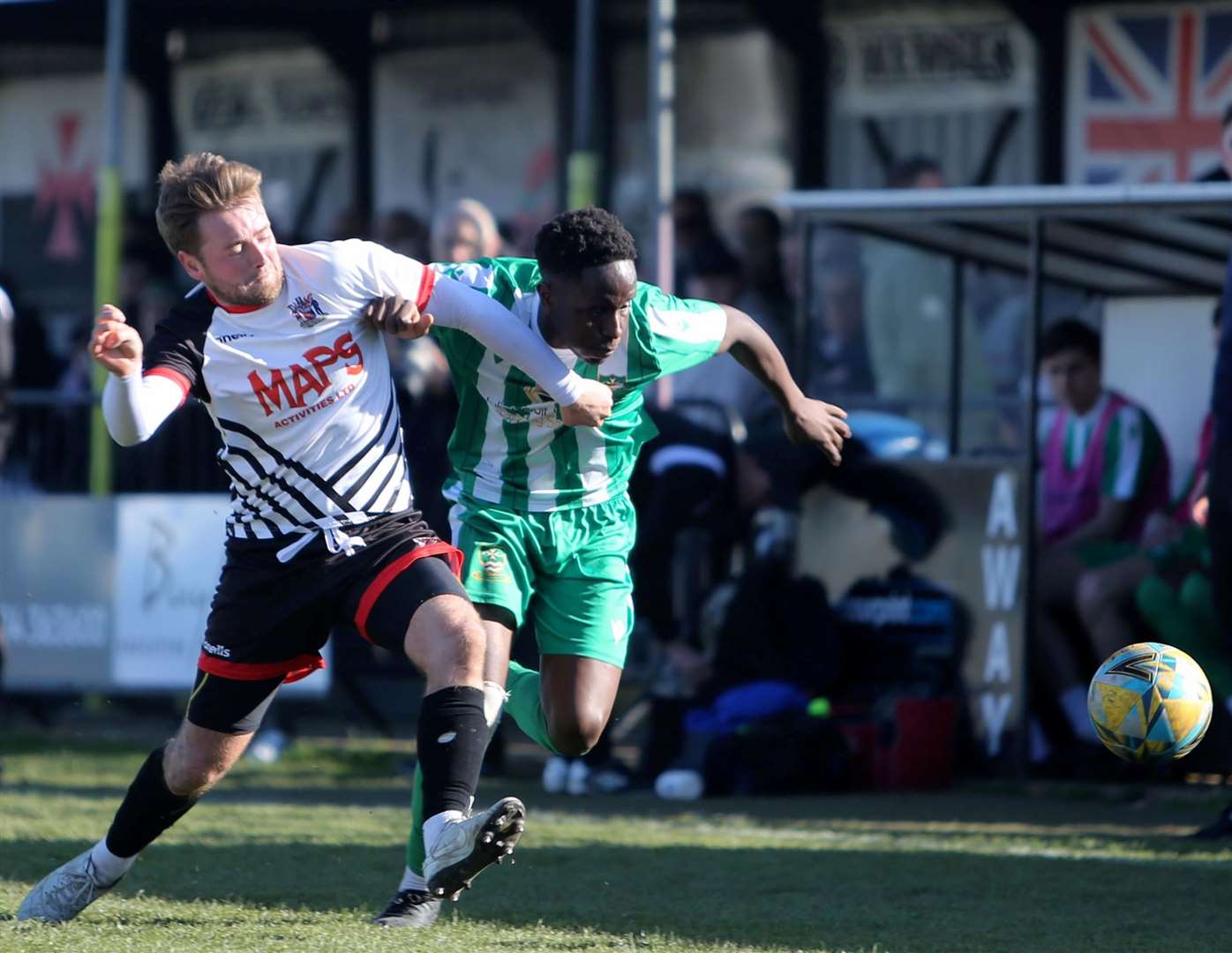 Macauley Murray in midfield action against Sutton Athletic. Picture: Paul Willmott