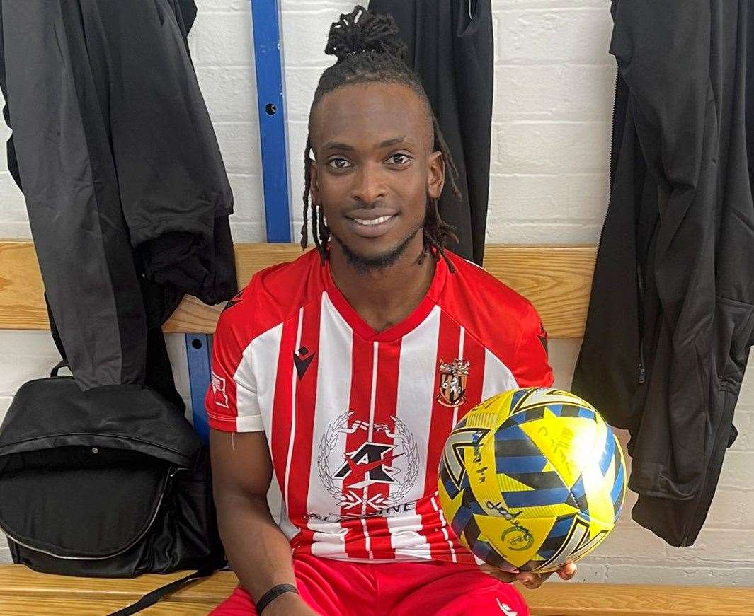 Folkestone Invicta's Ibrahim Olutade celebrates with the matchball after scoring a hat-trick. Picture: Twitter/Ibrahim Olutade