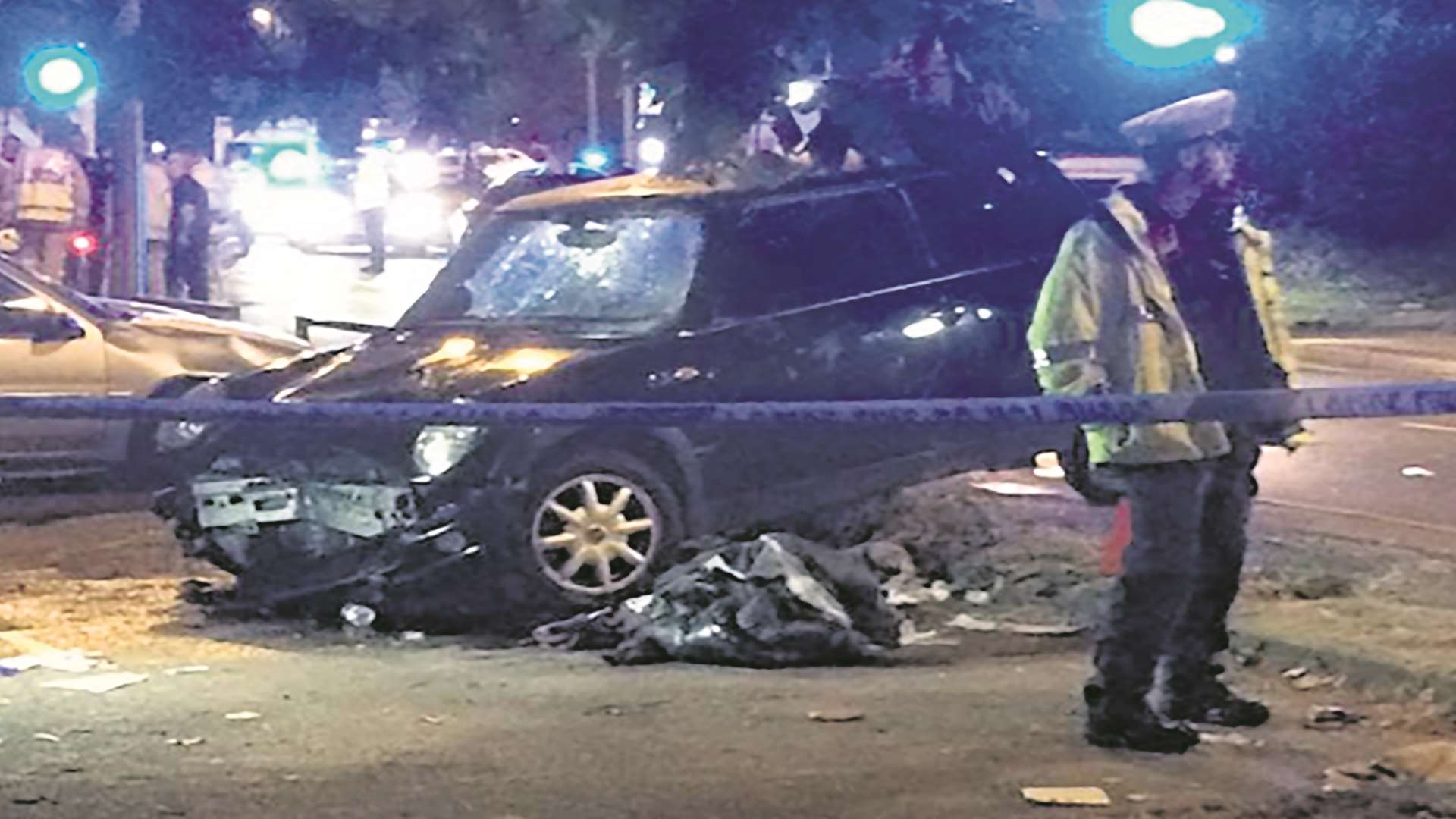 People were trapped underneath the car. Picture: Toby Diamond