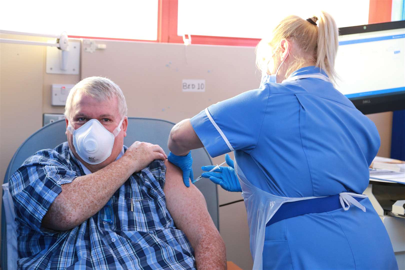 Graeme Sanders, consultant in anaesthetics and critical care at Medway Maritime Hospital, is among the first to receive the Covid-19 Pfizer vaccine at the hospital in Gillingham. Picture: Medway NHS Foundation Trust