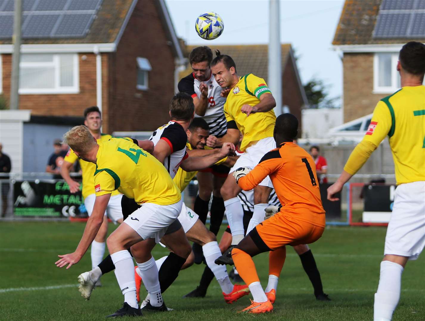 Billy Munday of Deal outjumps Corinthian captain Jamie Billings in the Hoops’ weekend 2-1 win. Picture: Paul Willmott