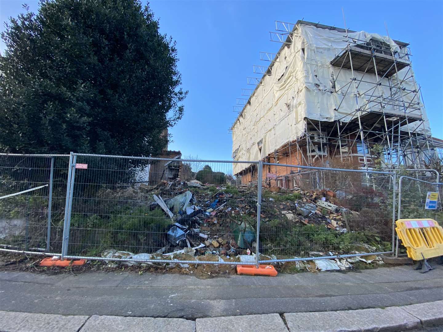 The homes in Wear Bay Crescent, Folkestone, a year after a huge fire tore through them. Picture: Steve Salter