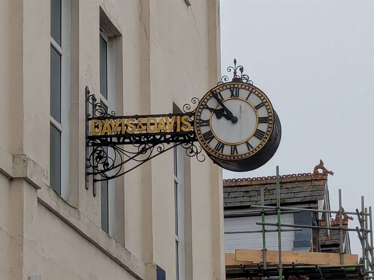 The clock on the former Davis & Davis building in Cheriton Road is more than an hour slow