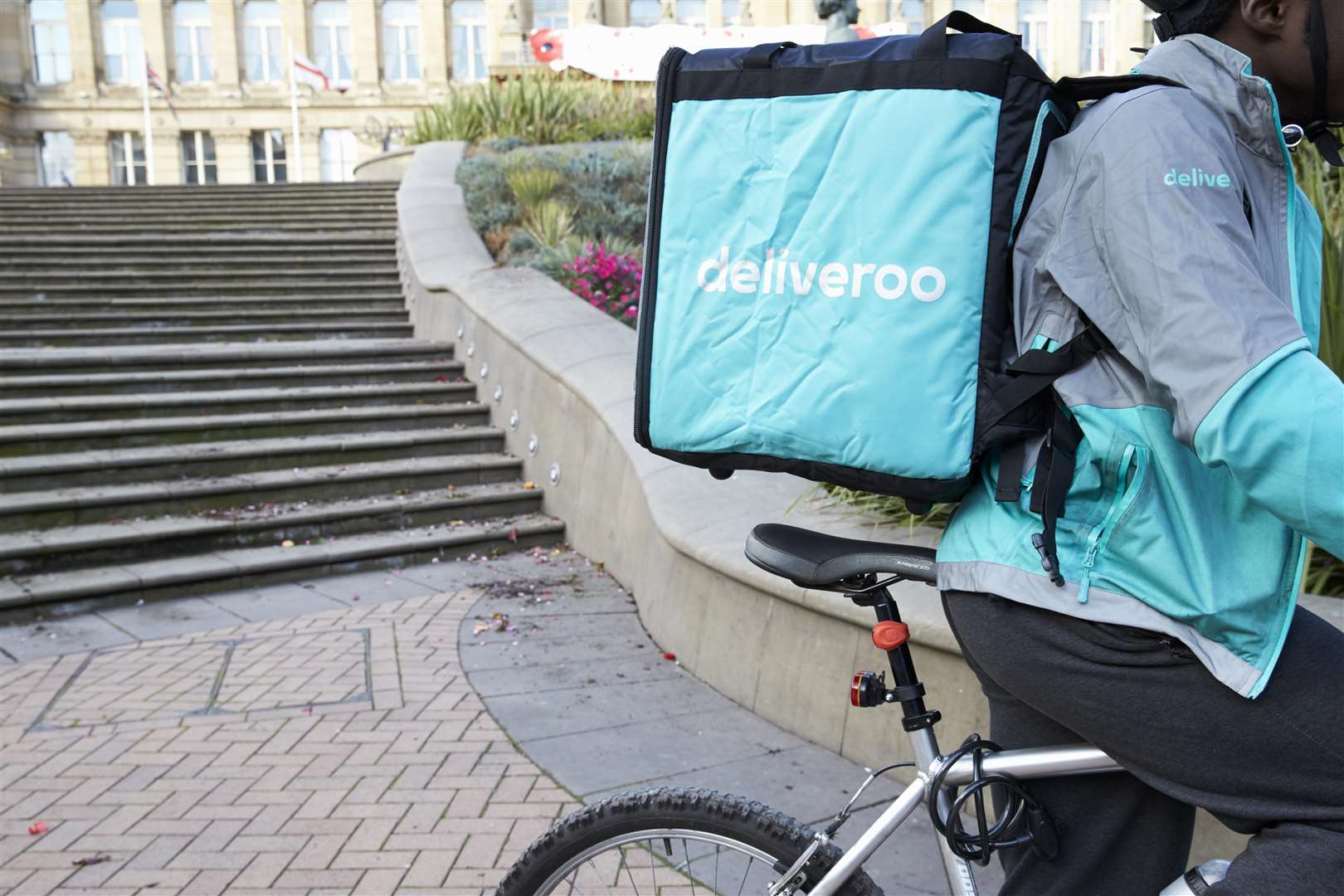 Birmingham, UK - 6 November 2016: Food Delivery Person Wearing Backpack Riding Bicycle (3502183)