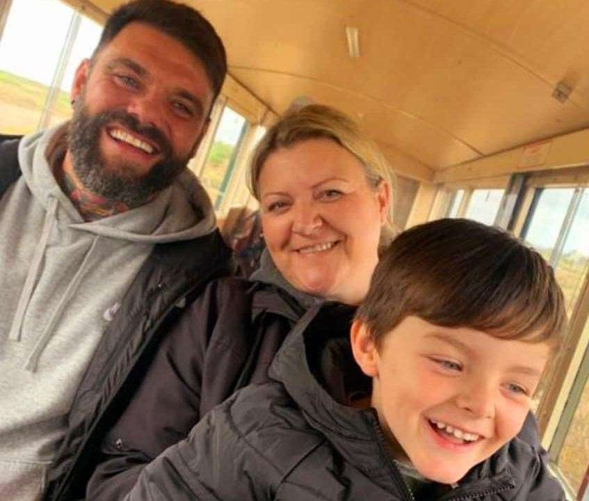 Faversham resident Carl Dobson with his partner Michelle and his grandson Ezra. Picture: Rochelle Impett