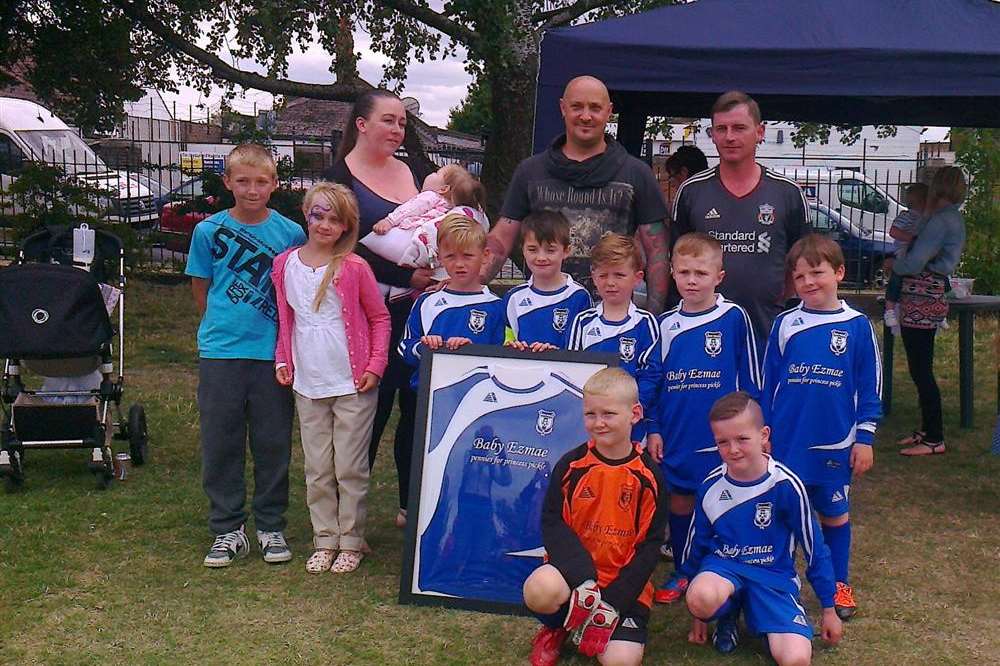 Ezmae Catley's family with members of New Road FC