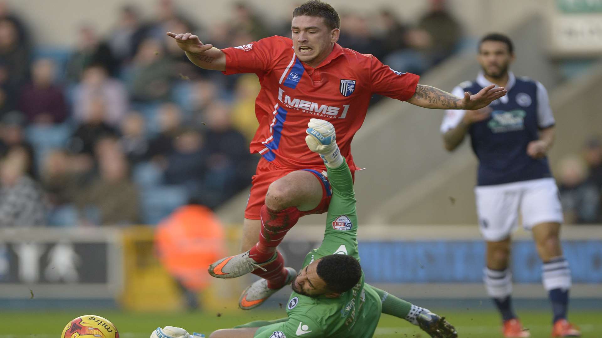 Cody McDonald suffers a broken foot in collision with Millwall keeper Jordan Archer