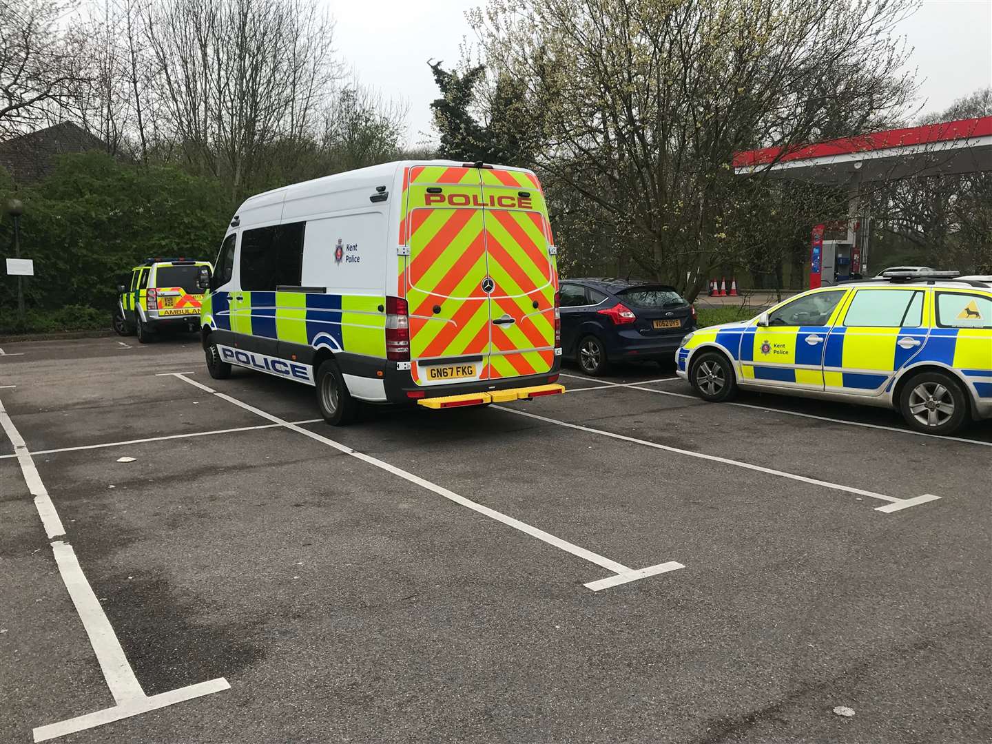 Police at the Esso Garage near the Brotherhood Wood caravan site