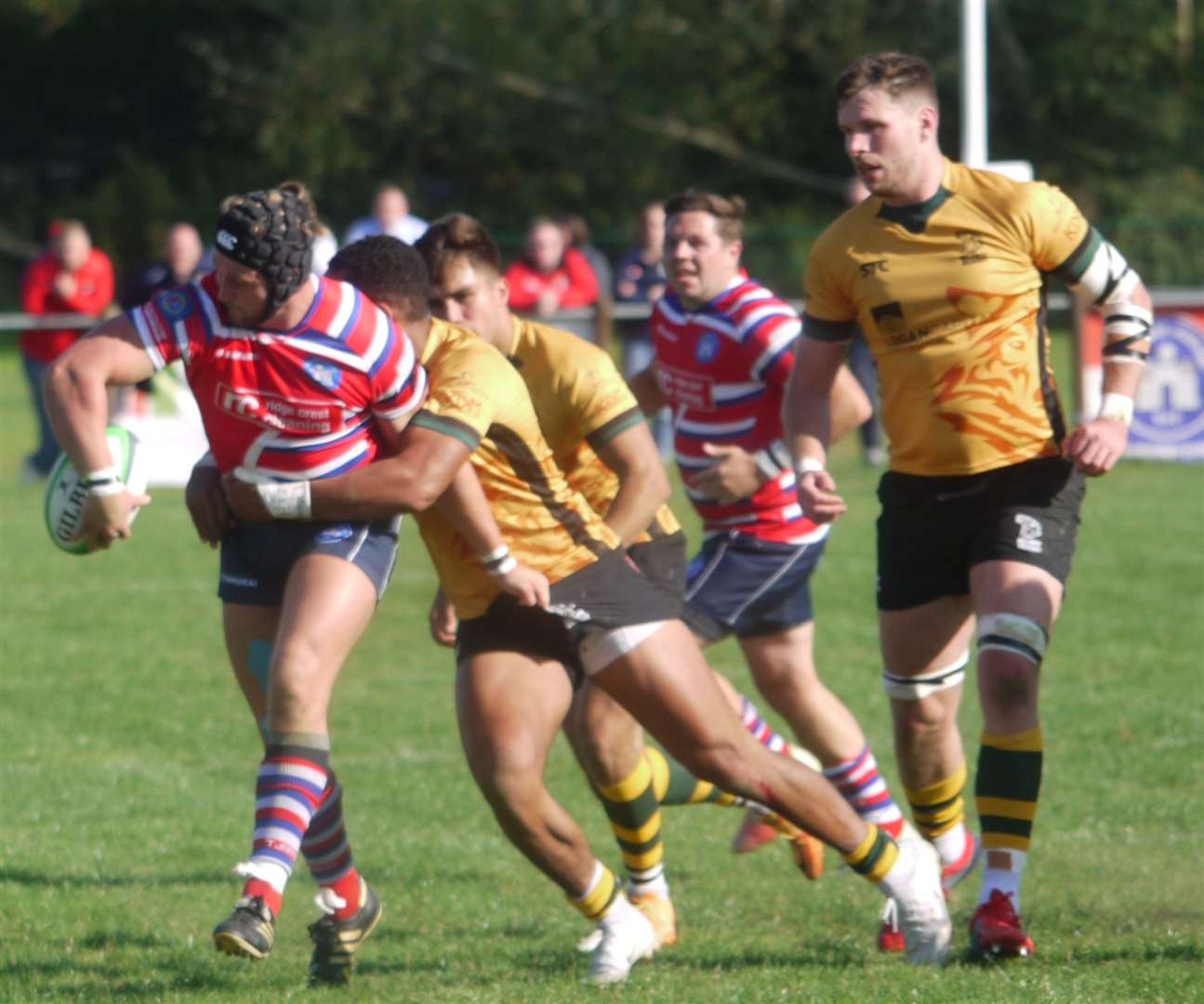 Try-scorer Duncan Tout offloads for Tonbridge on Saturday. Picture: Adam Hookway