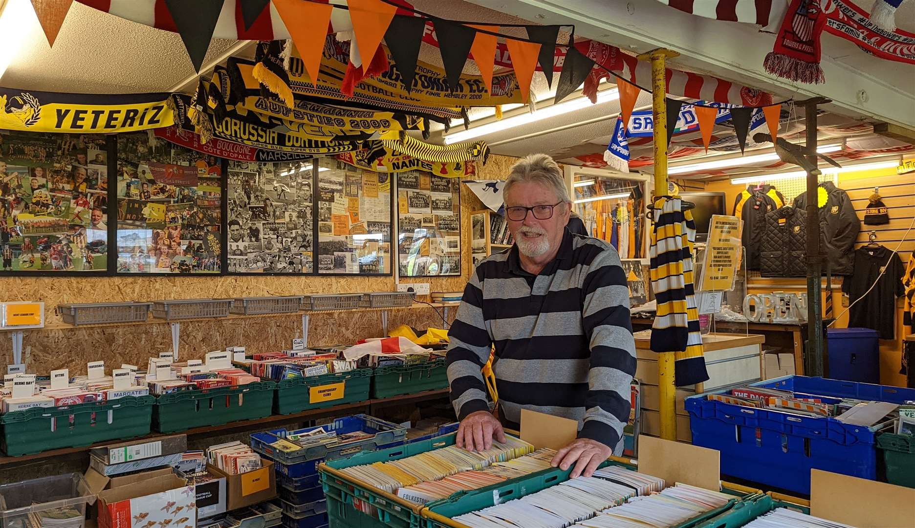 Geoff Senior and his fellow volunteers have collected a remarkable range of football programmes and other memorabilia in the Folkestone Invicta club shop