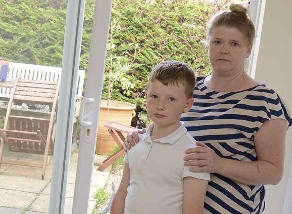 Amanda Joynson and son Isaac, 10, said the water came gushing through the back doors