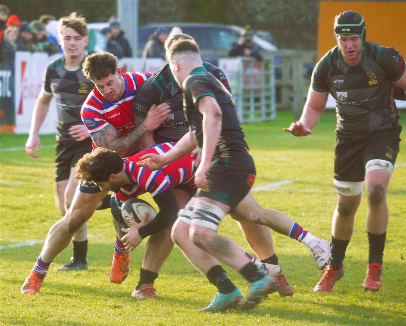 Tonbridge Juddians' Luca Petrozzi, with Shadyn Osgood in support, is upended against Bury St Edmunds. Picture: Adam Hookway